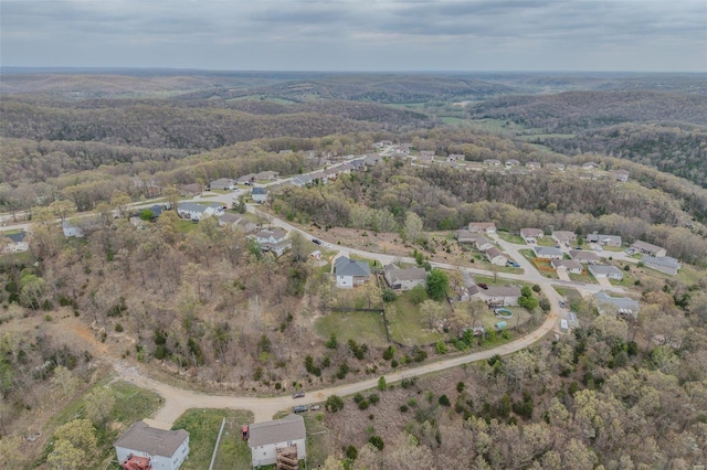 bird's eye view featuring a residential view and a forest view