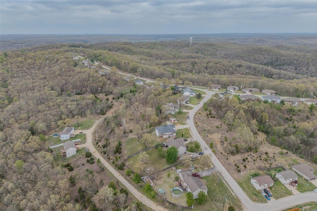 bird's eye view with a forest view