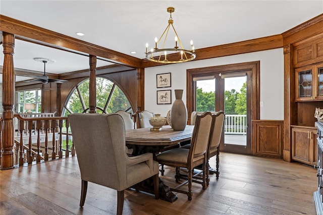 dining room featuring light wood-style flooring, recessed lighting, a chandelier, and a healthy amount of sunlight