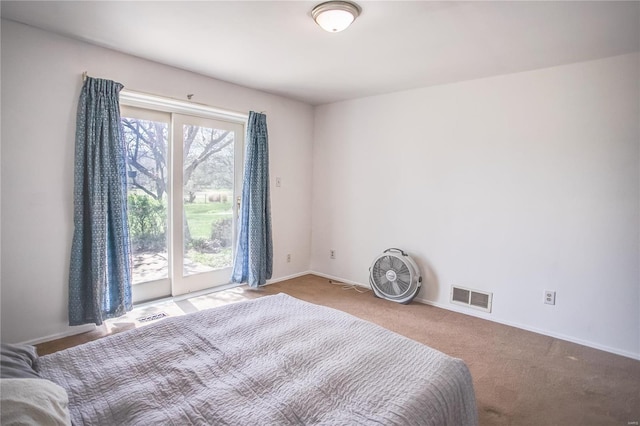 bedroom with access to outside, baseboards, visible vents, and carpet floors