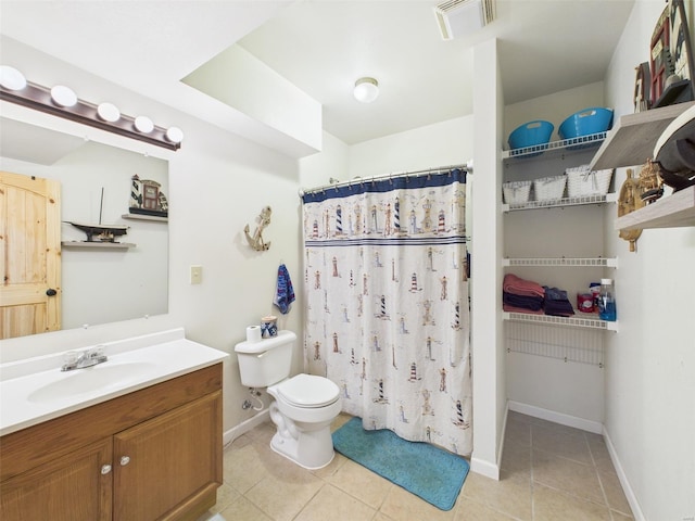full bathroom with visible vents, toilet, tile patterned flooring, and baseboards