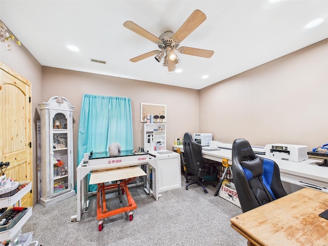 carpeted office with a ceiling fan, visible vents, and recessed lighting