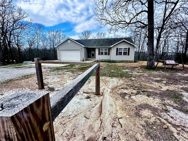 view of front of house featuring a garage and driveway