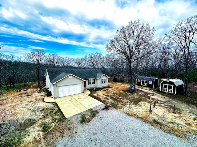 view of front of house with a garage and driveway