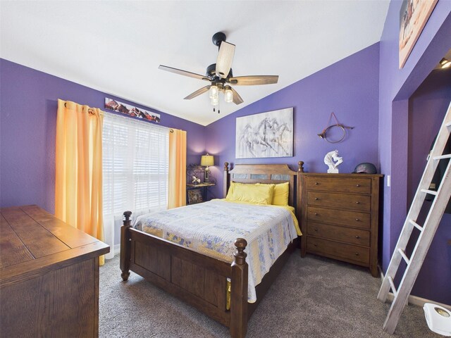 bedroom with carpet, vaulted ceiling, and ceiling fan