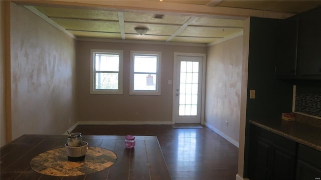 dining area with baseboards, visible vents, beamed ceiling, coffered ceiling, and wood finished floors