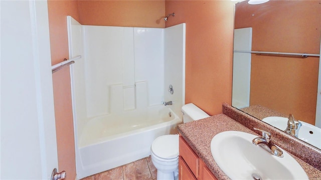 bathroom featuring vanity, toilet, and  shower combination