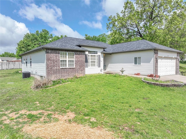 single story home with brick siding, a garage, central AC unit, a front yard, and concrete driveway