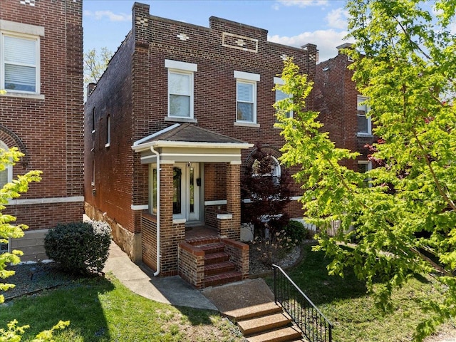 view of front of home with brick siding