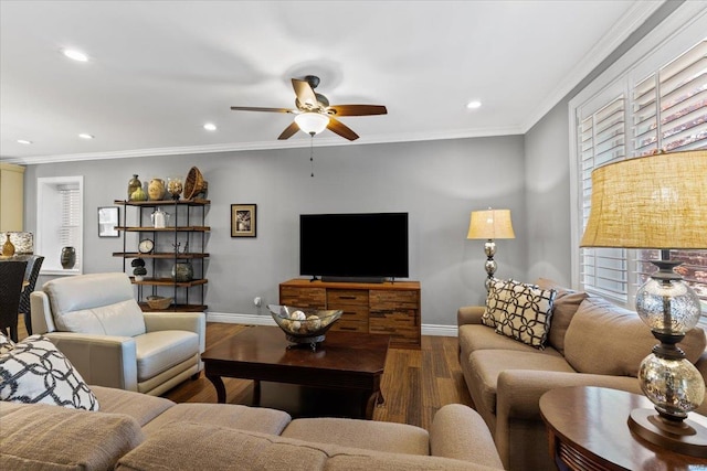 living area with crown molding, wood finished floors, ceiling fan, baseboards, and recessed lighting