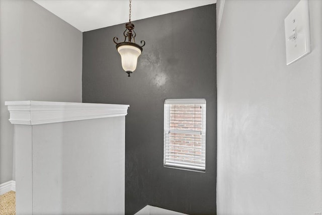interior space with baseboards