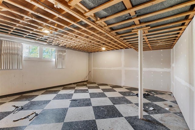 basement with tile patterned floors