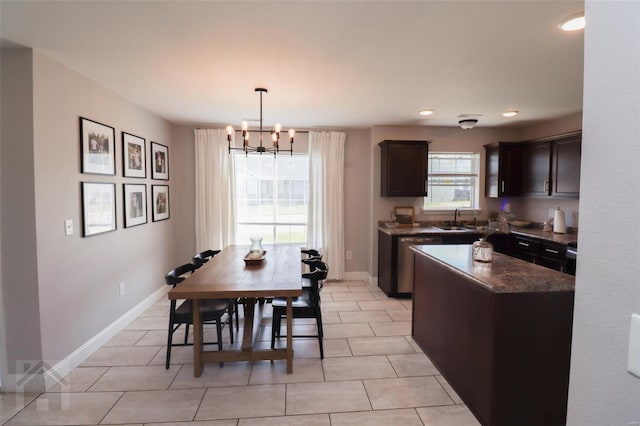 dining space featuring recessed lighting, baseboards, a chandelier, and light tile patterned floors