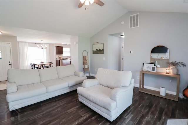 living room with wood finished floors, ceiling fan with notable chandelier, baseboards, lofted ceiling, and visible vents