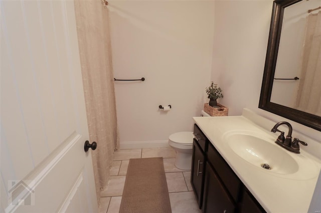 bathroom with a shower with curtain, tile patterned floors, vanity, and toilet