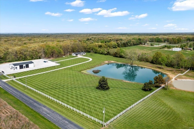 aerial view featuring a water view and a forest view