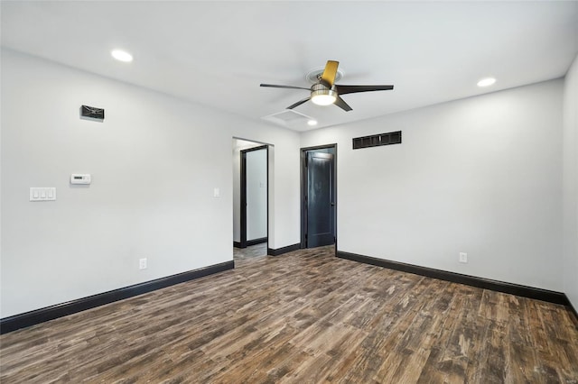 empty room with ceiling fan, visible vents, recessed lighting, wood finished floors, and baseboards