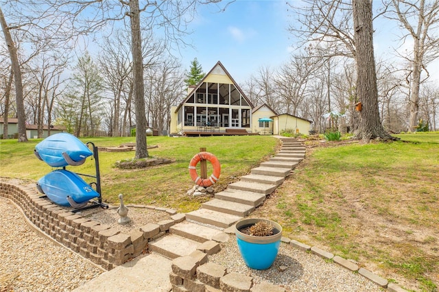 exterior space with a sunroom and a deck
