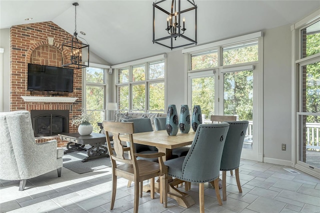 sunroom featuring an inviting chandelier