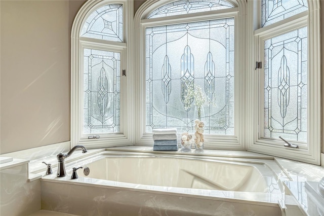 full bathroom with a garden tub