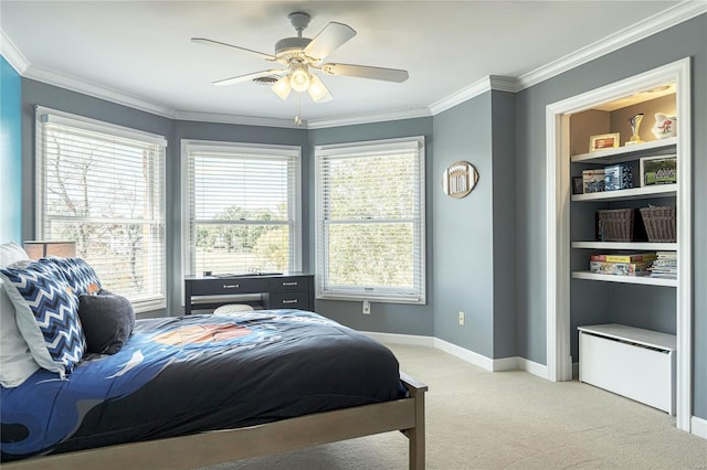 bedroom featuring baseboards, ornamental molding, light carpet, and ceiling fan