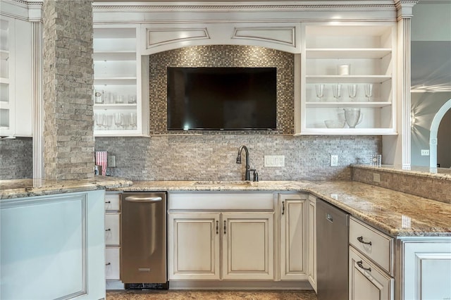 bar with a sink, backsplash, and dishwasher