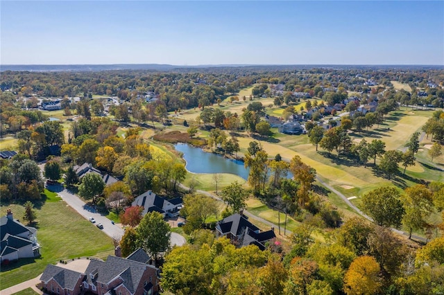 drone / aerial view with a residential view, a water view, and golf course view