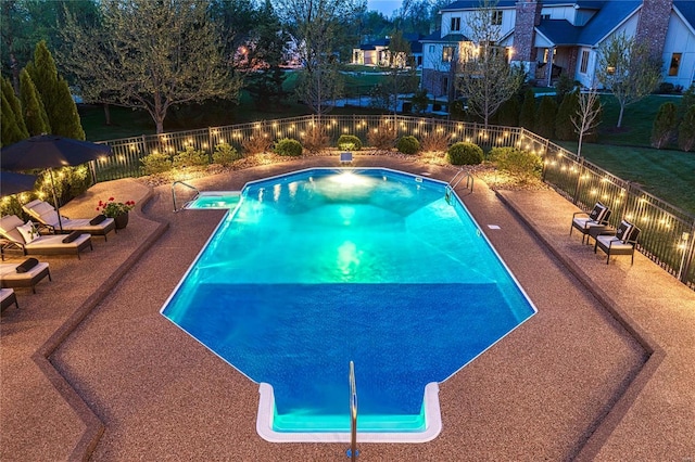 view of pool with a fenced in pool, a fenced backyard, and a patio area