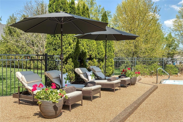 view of patio / terrace with fence and an outdoor hangout area