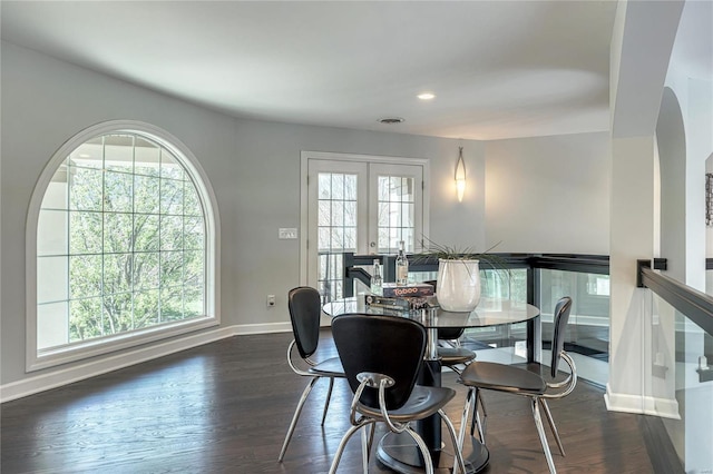 dining room with recessed lighting, baseboards, dark wood-style floors, and french doors