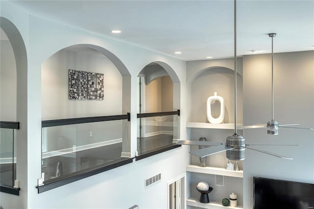 interior details with visible vents, recessed lighting, and ceiling fan