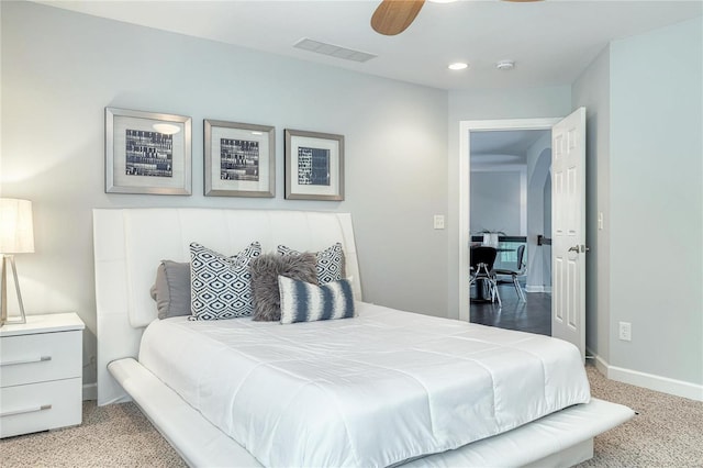 carpeted bedroom with visible vents, a ceiling fan, baseboards, and recessed lighting
