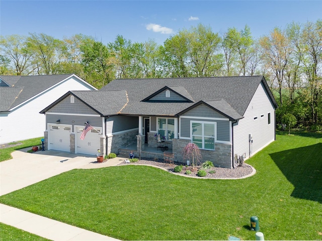 craftsman inspired home featuring driveway, stone siding, roof with shingles, a front lawn, and a garage