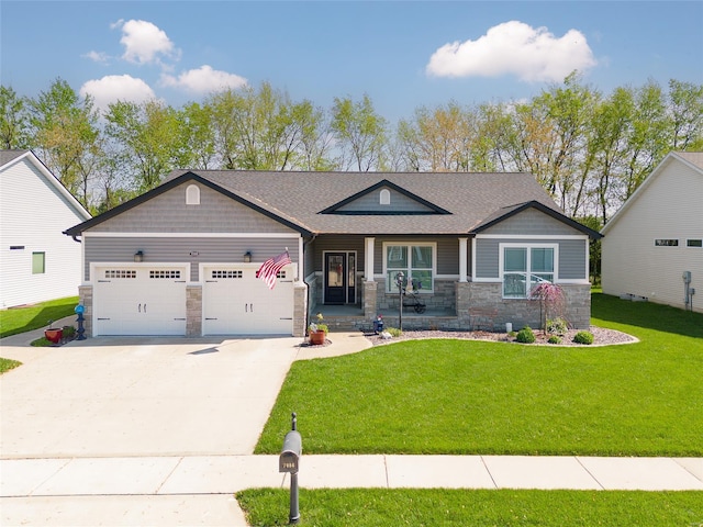craftsman inspired home featuring a front yard, concrete driveway, stone siding, and an attached garage