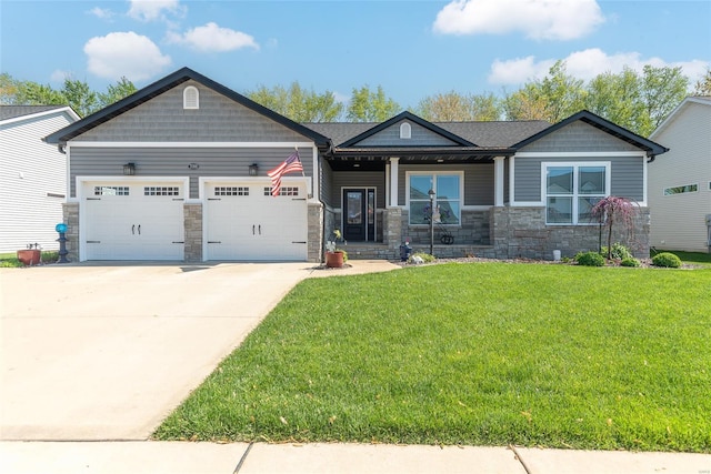 craftsman-style home with a front yard, a garage, covered porch, stone siding, and concrete driveway