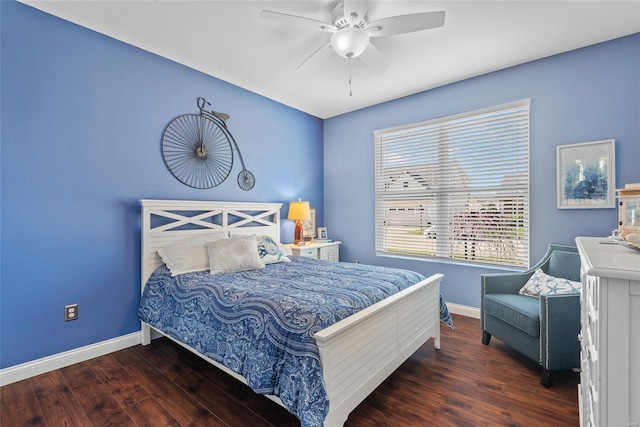 bedroom with wood finished floors, ceiling fan, and baseboards