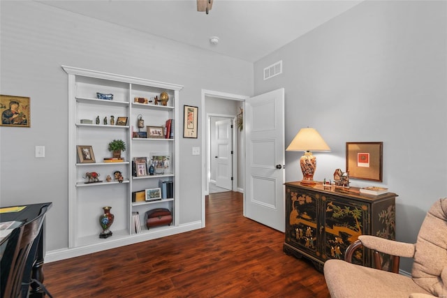sitting room with visible vents and wood finished floors