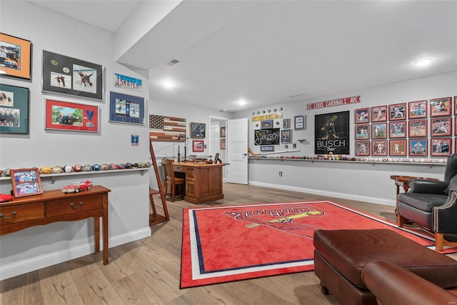 living room featuring recessed lighting, visible vents, wood finished floors, and baseboards