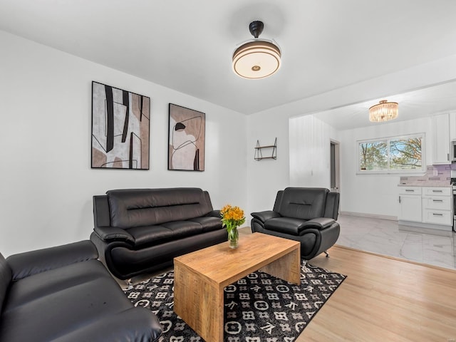 living area with a chandelier