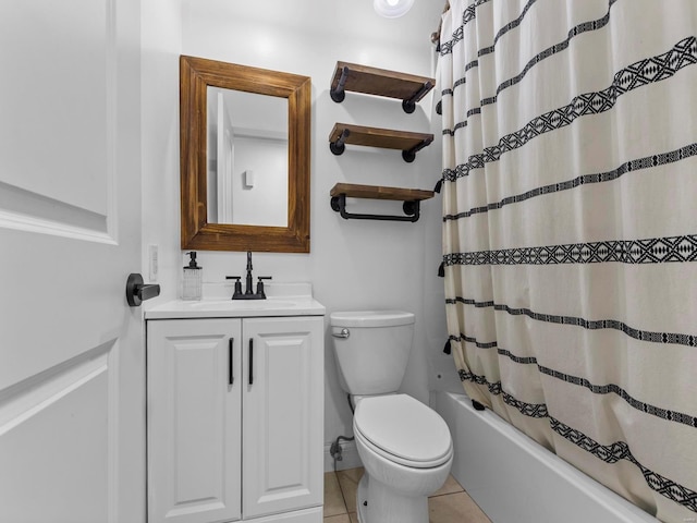 full bathroom featuring shower / tub combo, vanity, tile patterned flooring, and toilet
