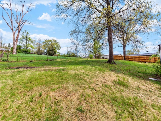 view of yard with fence