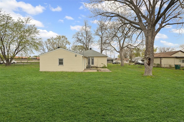 back of house with a yard, a patio area, and fence