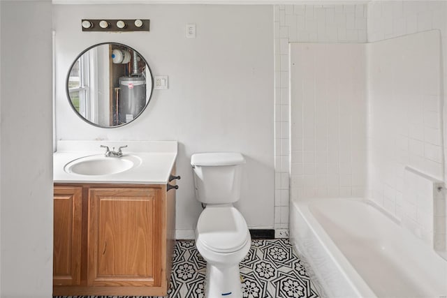 full bath with toilet, tile patterned floors, vanity, and baseboards