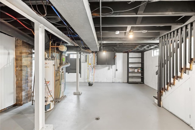 below grade area with water heater and stairs