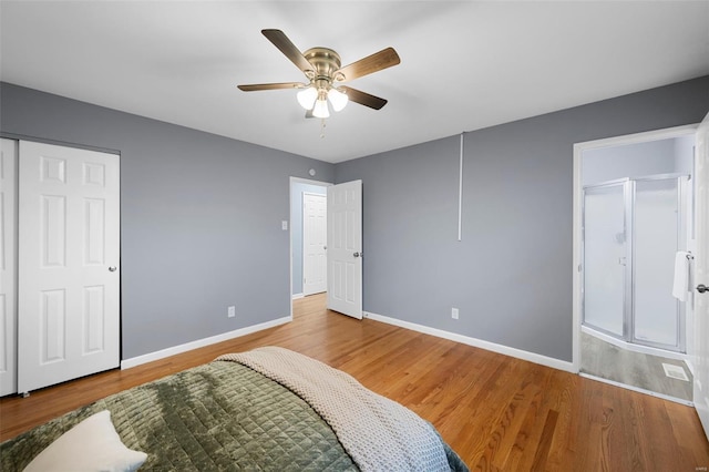 bedroom with baseboards, a ceiling fan, and wood finished floors