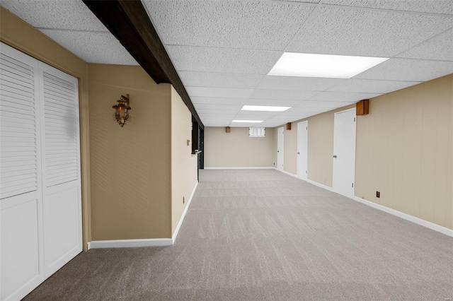 finished below grade area with carpet flooring and baseboards