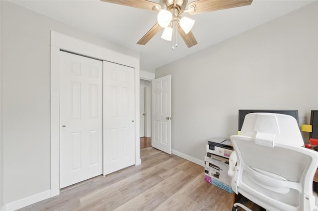 office with ceiling fan, baseboards, and light wood-style floors