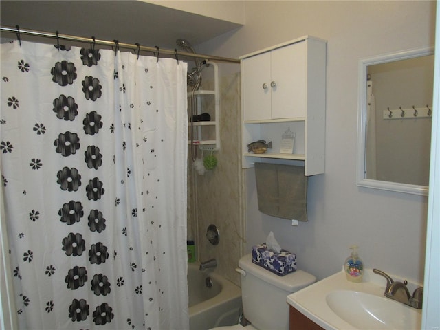 full bathroom with toilet, vanity, and shower / tub combo with curtain