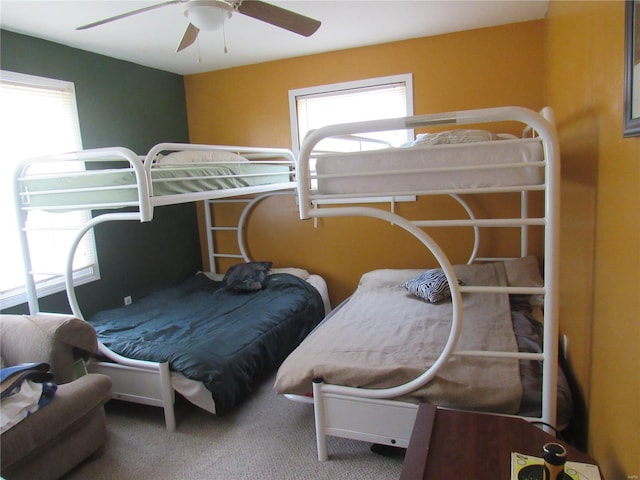 bedroom featuring carpet floors and a ceiling fan