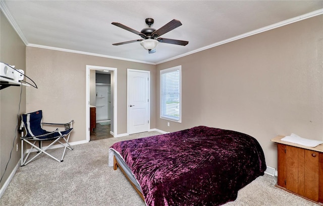 carpeted bedroom with crown molding, ensuite bathroom, baseboards, and ceiling fan